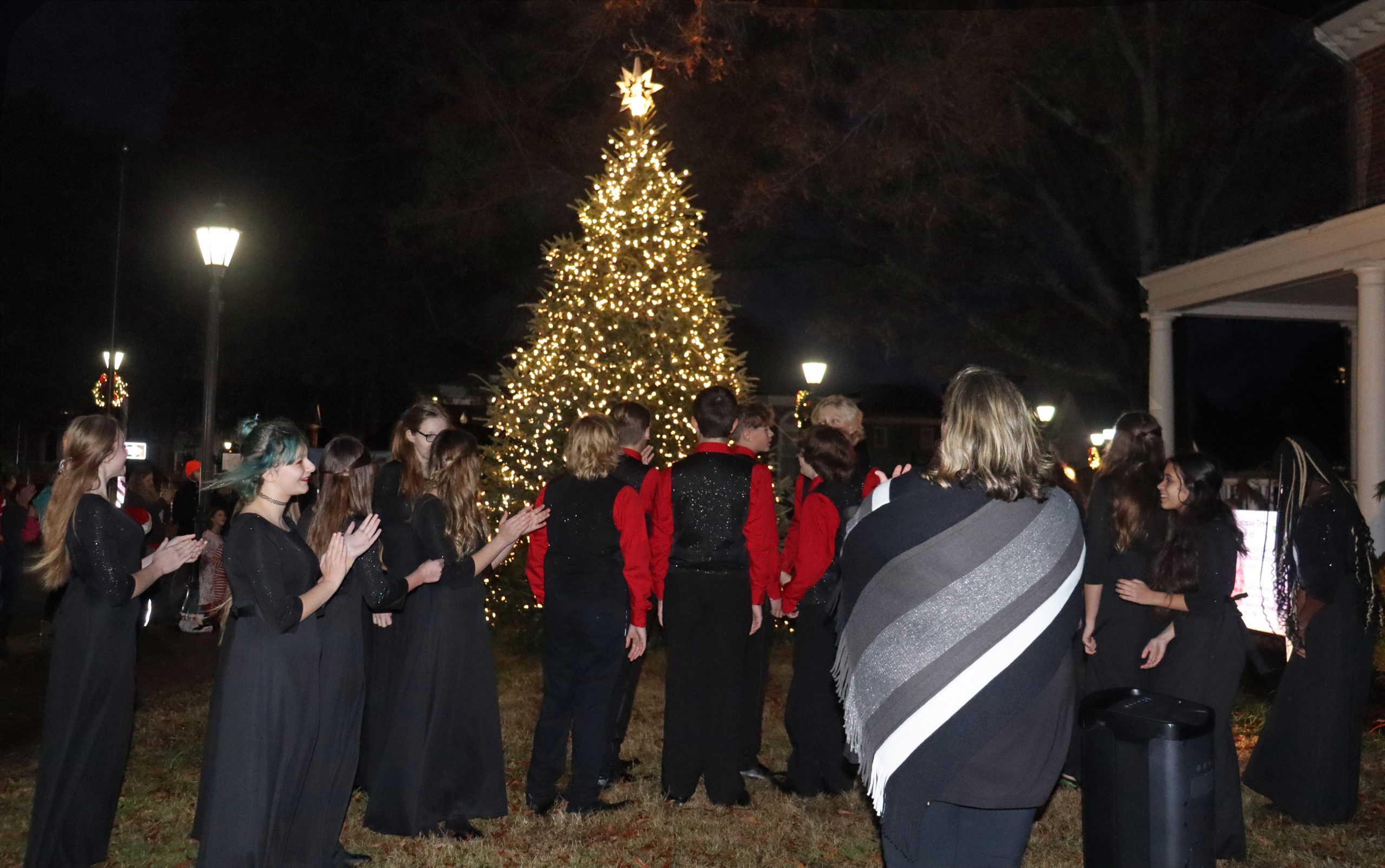 gloucester tree is lighting clapping Gazette Journal