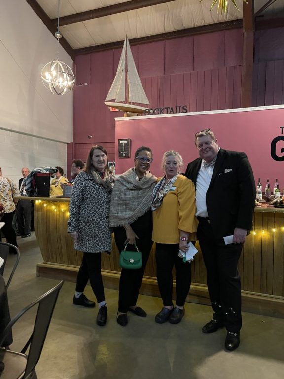 The Gloucester Daffodil Club’s annual auction and gala was held on Saturday, Nov. 18 at Zoll Vineyards, Dutton. Among those attending were, from left, Ceci Brown, Varetta Hamlin, Carla Stanley and Bill Thomas.