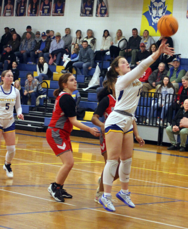 CHARLIE KOENIG / GAZETTE-JOURNAL MHS senior Angel Shultz takes a shot at the basket in Saturday’s game against Rappahannock. Shultz hit a layup to send that game into OT.